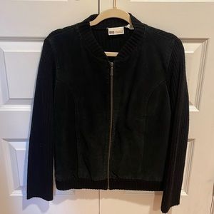 Used. Suede and polyester lining. Super comfortable and in perfect condition.